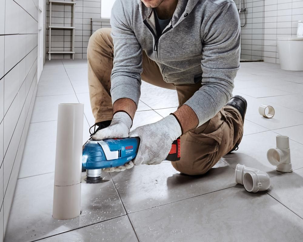 Akku-Multitool solo GOP 18V-34 + AC Bosch ohne Akku ohne Ladegerät L-Boxx