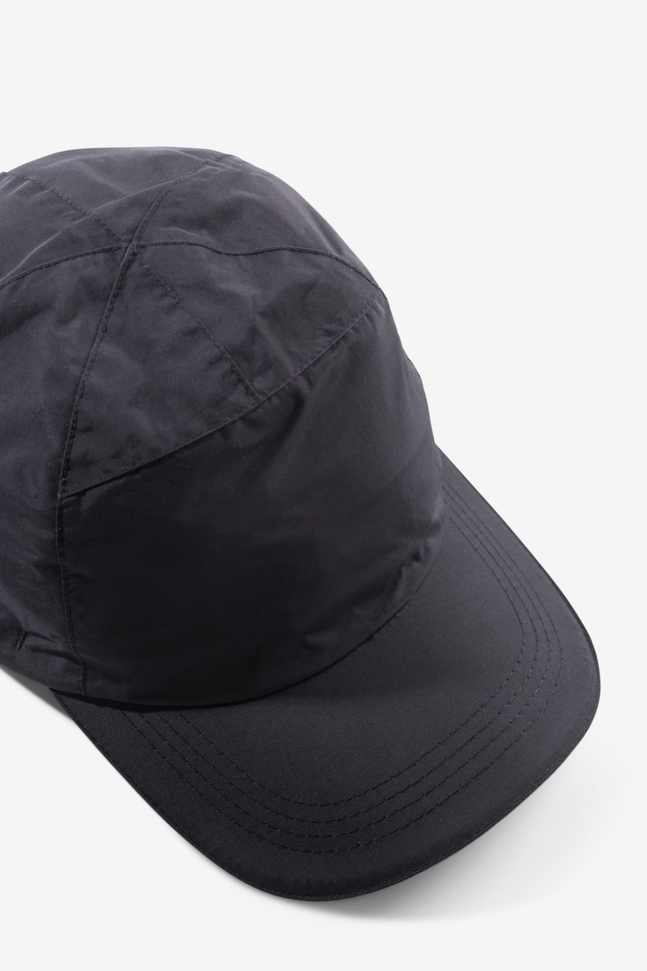 NIKLAS Cap Wasserdicht schwarz OSI